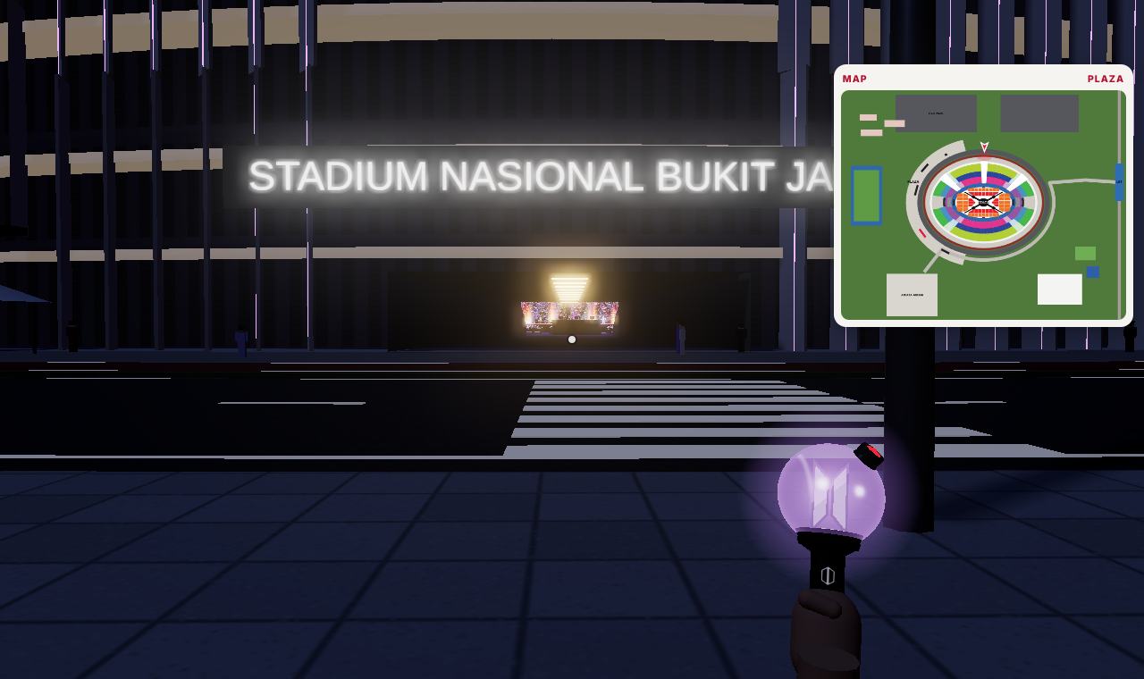Walking on the plaza in front of the stadium at night